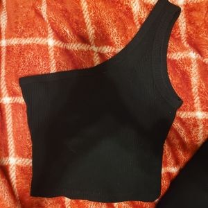 Black one shoulder crop top.